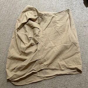 Beige zip up skirt.